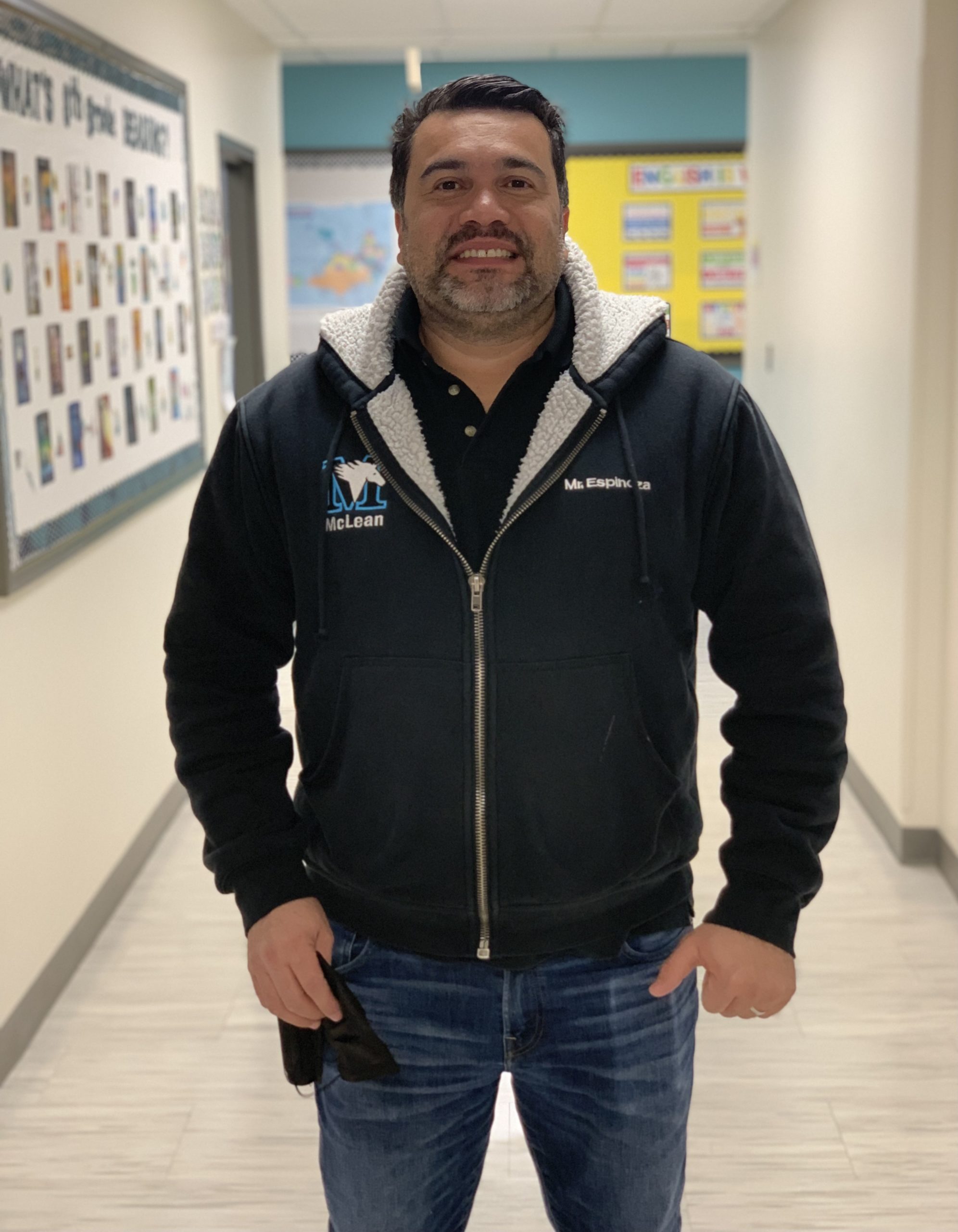 Danilo Espinoza, a Facilities Manager at McLean, smiling for the camera