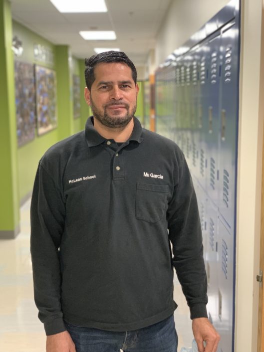 Noel Garcia, Building Facilities, smiles at camera